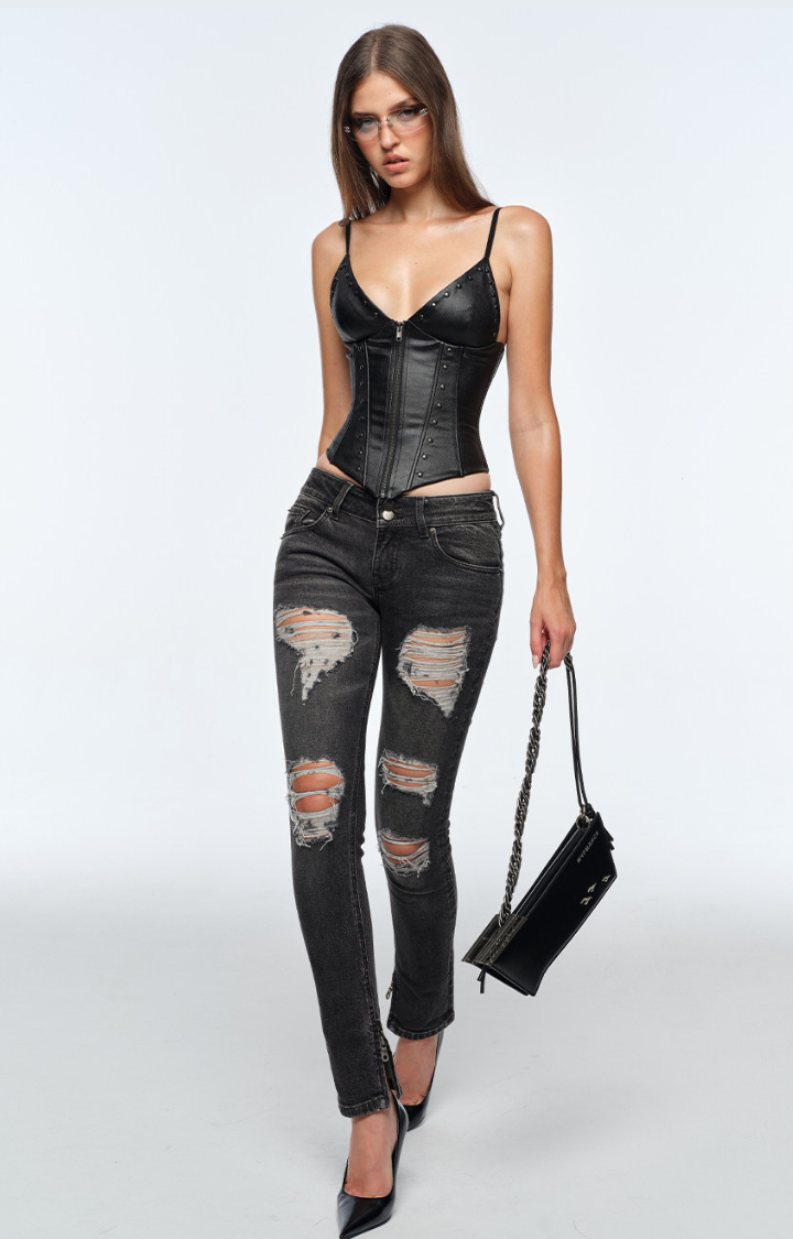 BAD ALIBI RIVET CORSET TOP IN BLACKOUT