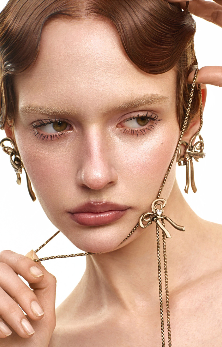 GILDED SILENCE BOW EARRINGS