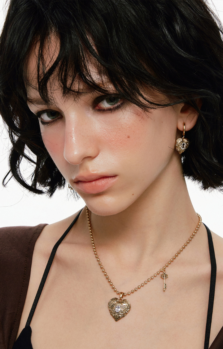 LOCKED HEART ASYMMETRIC EARRINGS