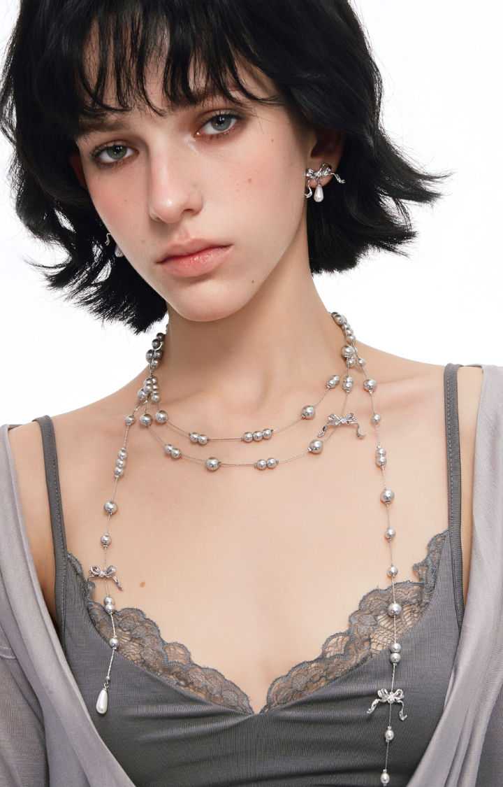 RIBBON THREAT PEARL STUD EARRINGS