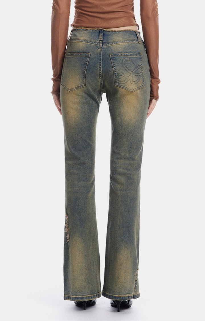 DIRTY ANGEL LOW-RISE FLARE JEANS
