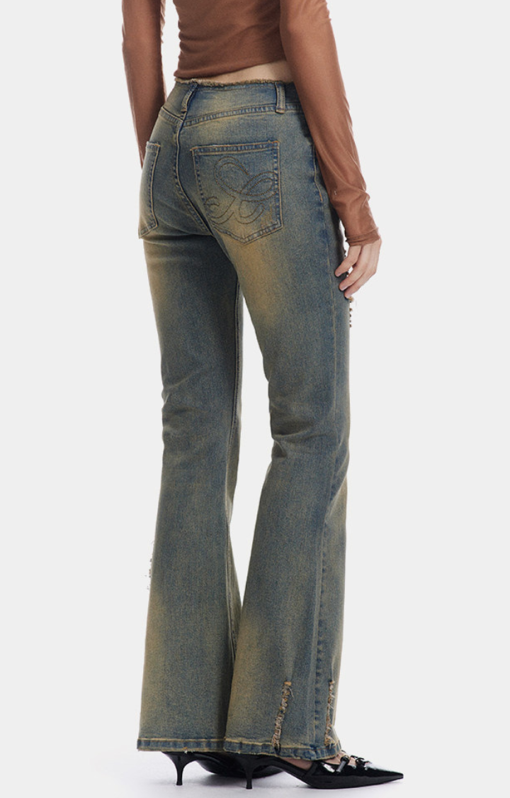 DIRTY ANGEL LOW-RISE FLARE JEANS