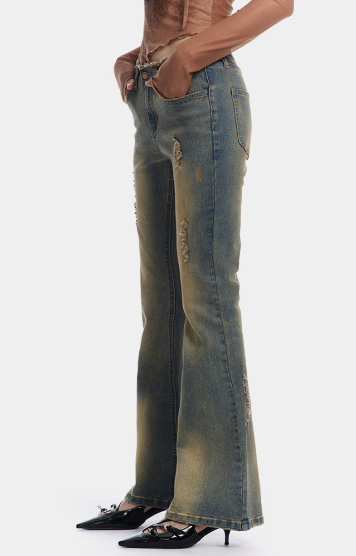 DIRTY ANGEL LOW-RISE FLARE JEANS